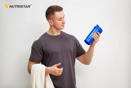 Man holding blue protein shaker, shop health supplements at Nutristar online store