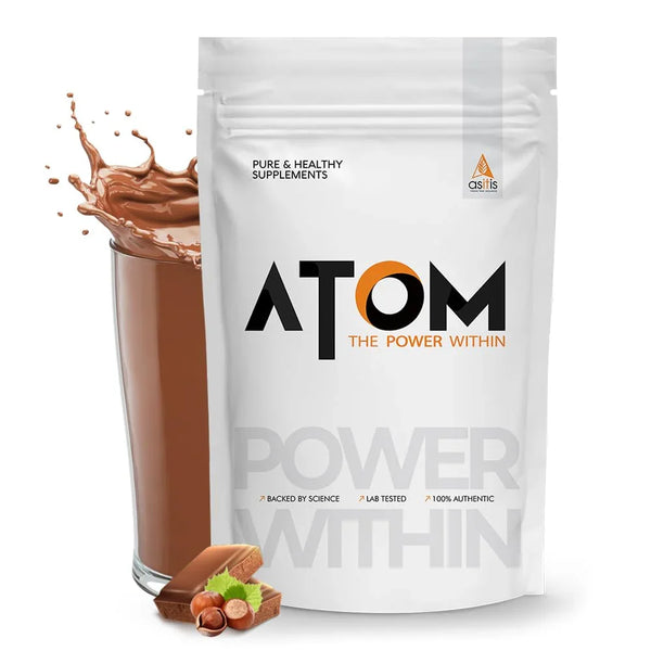 Buy ATOM chocolate health supplement powder online at Nutristar with milk and hazelnuts shown.
